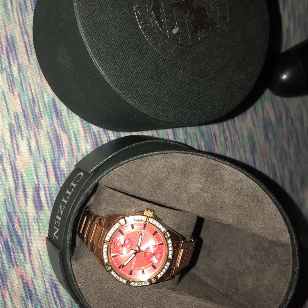 Gold Solar powered watch